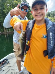 Two people fishing for largemouth bass in Harned