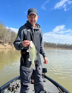 One person enjoying outdoor water sports and fishing activities in Harned