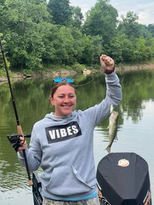 One person enjoying outdoor water sports and fishing activities in KY