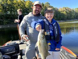 A 60-inch white bass caught in KY during a fishing tour