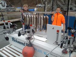 Two coho salmon, 19 inches long, caught while fishing in South Bristol