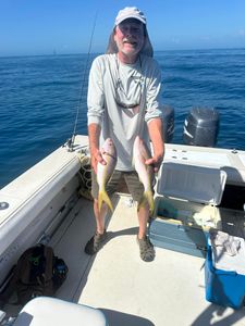 Two small fish caught while fishing in South Bristol