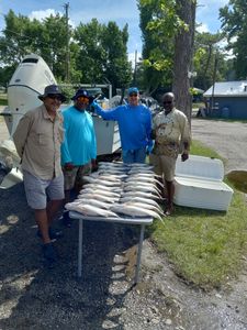 Four anglers enjoying a fishing trip in SC