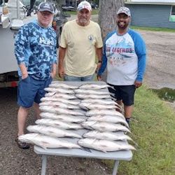 Three people enjoying a day of fishing in Lexington