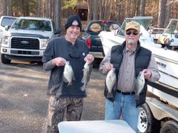 Three fishing rods with a scenic view of Lexington