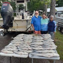 Three people fishing in South Carolina