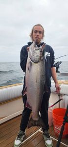 Catching a Coho Salmon while fishing in CA