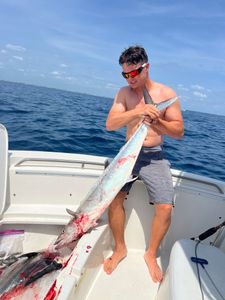 Two anglers with a 53-inch fish at Hobe Sound