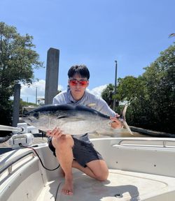 A person fishing in FL