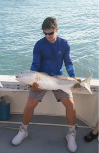 Angler with a 29-inch fish in Hobe Sound