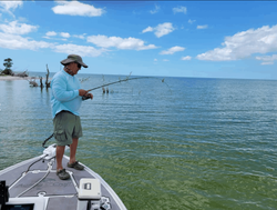 A lone angler fishing in the waters of Florida