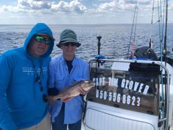 Redfish caught by two people fishing in FL