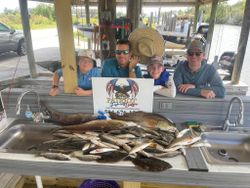 Two redfish, 22 inches, caught while fishing in LA