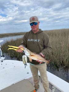 A person fishing in St Marks