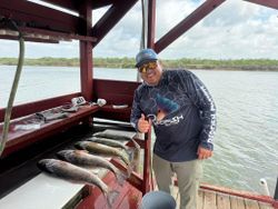 A person fishing in TX