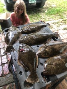 Anglers catch a school of Southern Flounder in Florida