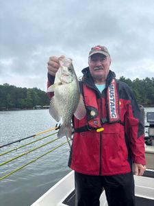 Fresh caught crappie held up on fishing boat in Cumming GA
