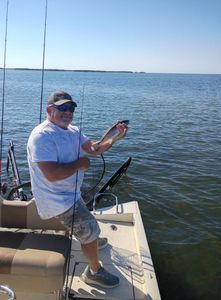 Person enjoying cruises and fishing in Florida