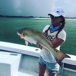 A single fisherman with a big 21-inch fish at Orange Beach