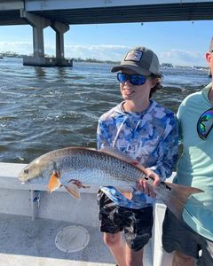 Person fishing at Orange Beach