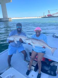 Two big redfish caught in Orange Beach
