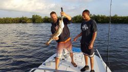A couple enjoy fishing together at New Smyrna Beach