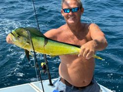Angler with fishing rod in DE