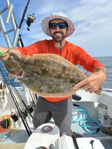 Nice Southern flounder on the boat today! Clear conditions made for some exciting fishing.