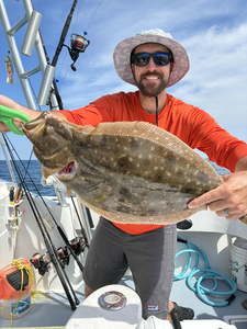 Nice summer flounder on the boat today! Clear conditions made for an exciting adventure.