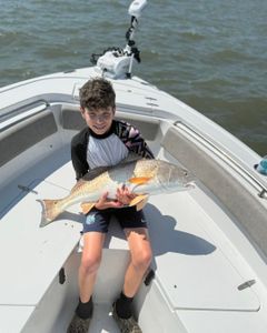 Angler with a big fish at Mount Pleasant
