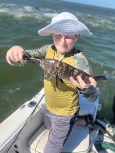 Angler with a 11-inch fish in SC