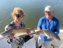 Two redfish, 23 inches long, caught in South Carolina