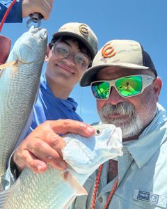 Three people fishing in Texas