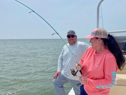 Two people fishing at Port Mansfield