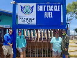 Three fishing enthusiasts in TX with their catch