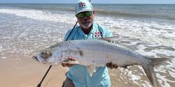 Photograph of a Tarpon, a large fish, caught while fishing in Port Mansfield