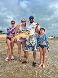 A group of 4 people fishing in TX