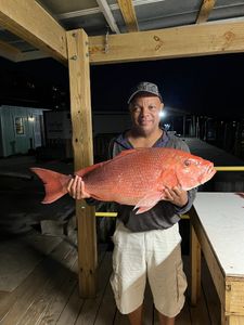A lone angler fishing in Pensacola
