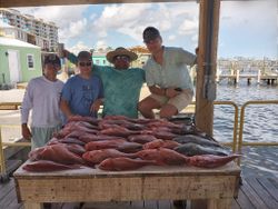 Four people fishing in Pensacola
