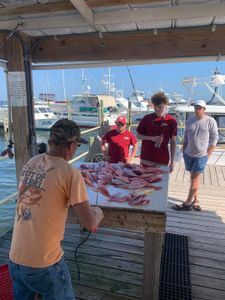 Three people fishing in Pensacola