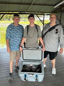 Three people fishing in West Tawakoni