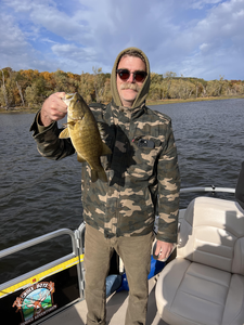 Nice smallmouth bass using deep sea jigging and trolling techniques before the afternoon rain rolled in.