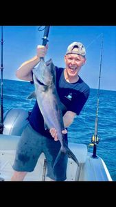 Angler holding a big 28-inch fish in FL