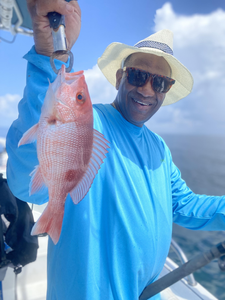 Deep sea jigging pays off with a prized Red Snapper in Pensacola!