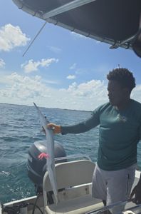 Angler with fishing rod in Nassau