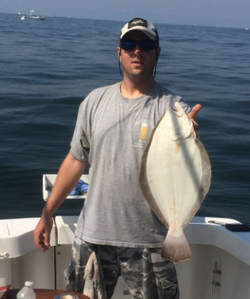 Angler with a 20-inch fish in Freeport
