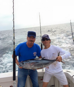 Two people enjoying a fishing trip in Freeport
