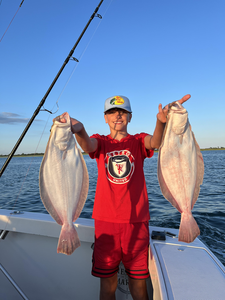 Hauling in huge catches with heavy tackle at Jones Inlet Marine!