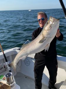 Angler reeling in a big 29-inch fish in NY