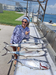 Three large wahoo fish, king mackerel, and atlantic bonito caught fishing in FL